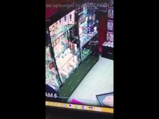 guy testing sex toy in store (spy)